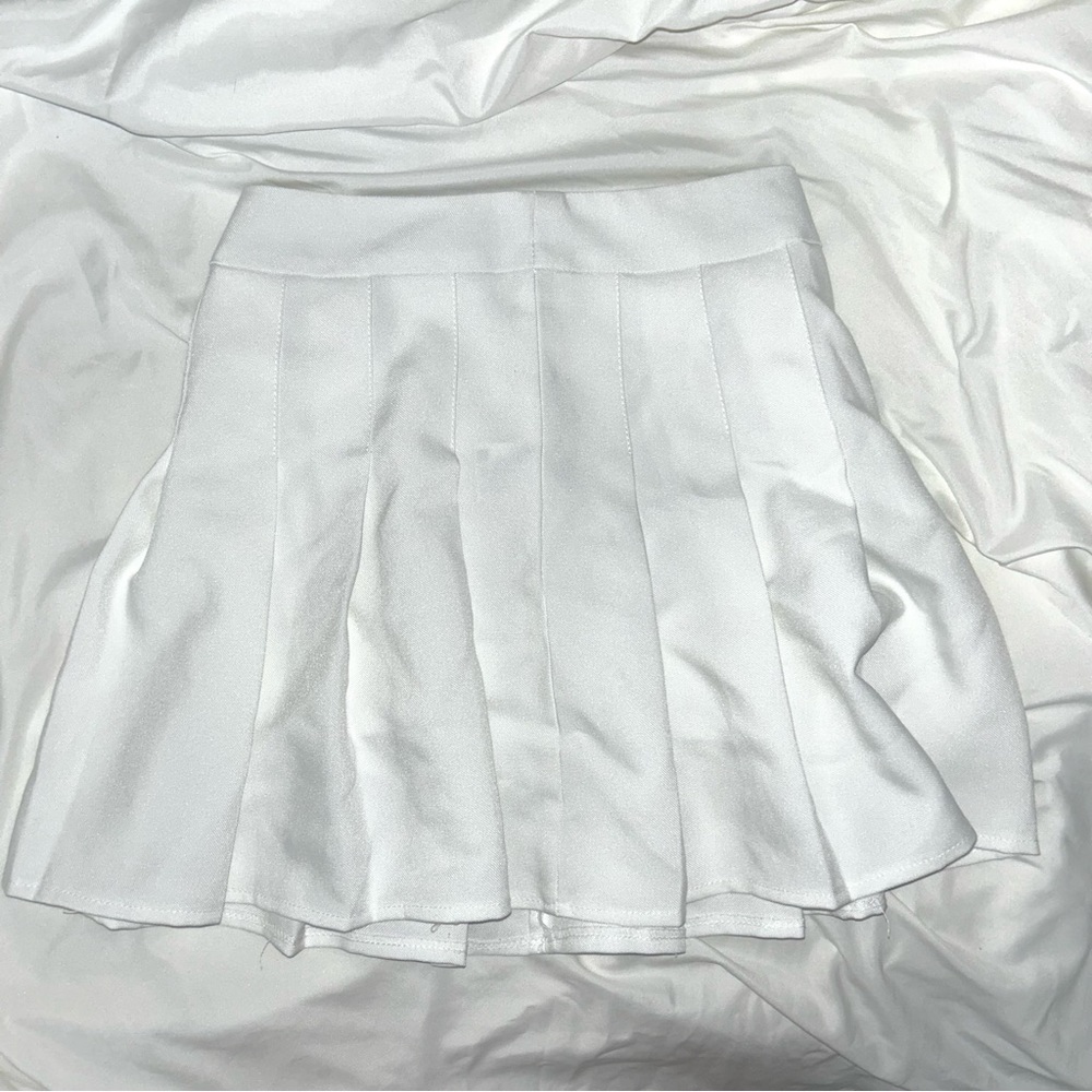 white pleated mini skirt